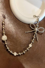 Load image into Gallery viewer, Silver Bow and Pearl Shoe Charm
