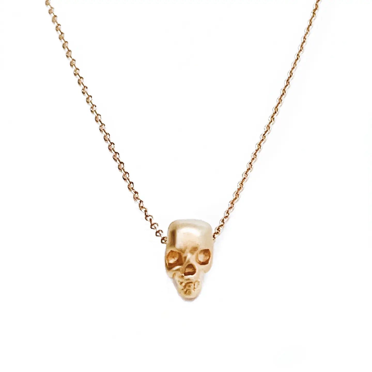 Gold skull necklace